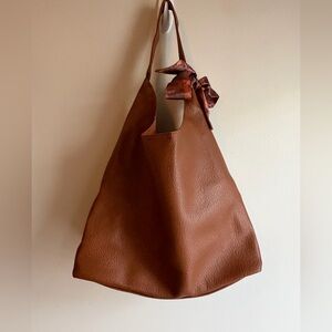 Chic Slouchy Brown Hobo Bag with Bow Accent and Matching Zipper Pouch